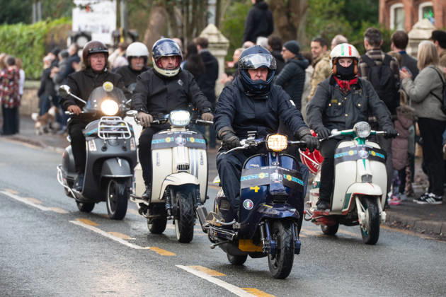 Scooter riders lead the funeral procession of Gary Mani Mounfield, Bass Player in the Stone Roses and Primal Scream, makes its way through Heaton Moor, Stockport on 22 December 2025. 22 12 2025 Stockport Greater Manchester England Heaton Moor  Copyright: xMattxWilkinsonx