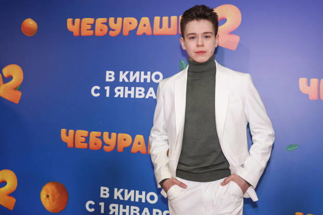 RUSSIA, MOSCOW - DECEMBER 24, 2025: Actor Mark Malik-Murashkin poses on the red carpet during the premiere of the family comedy Cheburashka 2 by Dmitry Dyachenko at the KARO 11 Oktyabr cinema on Novy Arbat Street (New Arbat Avenue). Valery Sharifulin TASS  86692611