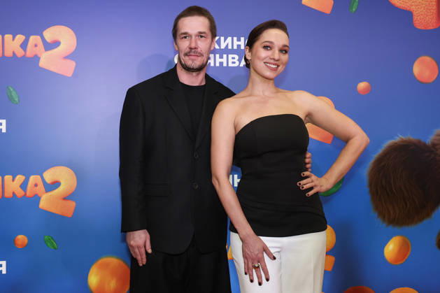 RUSSIA, MOSCOW - DECEMBER 24, 2025: Actors Artyom Bystrov and Ksenia Teplova pose on the red carpet during the premiere of the family comedy Cheburashka 2 by Dmitry Dyachenko at the KARO 11 Oktyabr cinema on Novy Arbat Street (New Arbat Avenue). Valery Sharifulin TASS  86692952