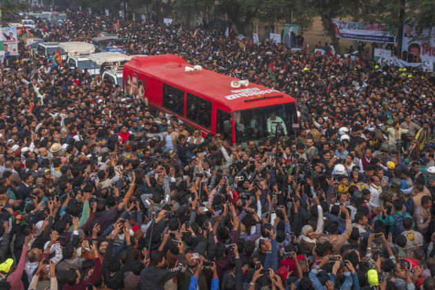 Tarique Rahman visits his father’s grave after 19 years in Bangladesh DHAKA, BANGLADESH - DECEMBER 26: Large crowds form around the BNP Acting Chairman Tarique Rahman s red-and-green bulletproof bus as he travels to visit his father s grave following his return to Bangladesh after a long exile, on December 26, 2025 in Dhaka, Bangladesh. Previously, on September 1, 2006, during the anniversary of the founding of the Bangladesh Nationalist Party (BNP), Tarique Rahman, then the party’s Senior Joint Secretary General—had last visited his father’s mausoleum. Nearly 19 years later, he once again stood at the grave in remembrance. Abdul Goni Anadolu Dhaka Bangladesh. Editorial use only. Please get in touch for any other usage.  Copyright: x2025xAnadoluxAbdulxGonix