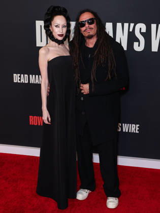 Los Angeles Premiere Of Row K Entertainment s Dead Man s Wire LOS ANGELES, CALIFORNIA, USA - JANUARY 07: Evis Xheneti Shaffer and husband James Shaffer of American nu metal band Korn arrive at the Los Angeles Premiere Of Row K Entertainment s Dead Man s Wire held at AMC The Grove 14 on January 7, 2026 in Los Angeles, California, United States., Credit:Xavier Collin Avalon United States, California, Los Angeles, AMC The Grove 14  Copyright: xXavierxCollinx xAvalonx 1064229817