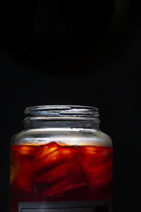 IMAGO Creative, Food, Trend, Iced Coffee large glass hug fill with cold brew coffee against black background Phoenix, Arizona, United States R_MALI260130-1951325-01