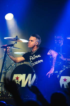 Robbie Williams performing at Barrowlands in Glasgow on 04 February 2026. Robbie Williams performing at Barrowlands in Glasgow on 04 February 2026 as part of his Long 90™s tour performing ˜Life Thru a Lens™ and new album ˜Britpop™ in full. Robbie Williams is a British singer and songwriter best known for solo singles ˜Angels™ and ˜Feel™ and as a member of the pop group Take That., Credit:Adam Hampton-Matthews Avalon  Copyright: xAdamxHampton-Matthewsx xAvalonx 1072124541