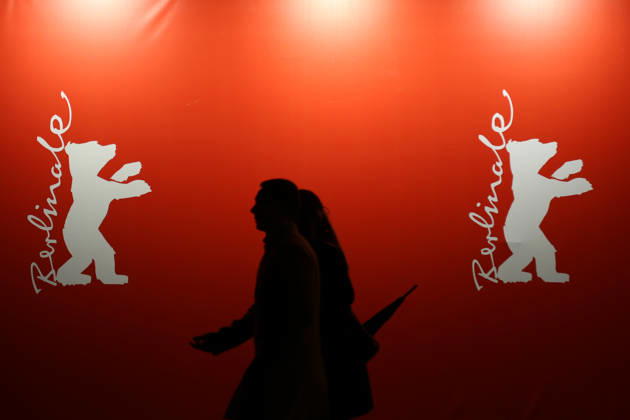 February 11, 2026, Berlin, Germany: Pedestrians walk past a large Berlinale banner in front of the Berlinale Palast ahead of the 76th Berlin International Film Festival (Berlinale) in Berlin. The festival runs from Feb. 12 to 22, 2026. Berlin Germany  - ZUMAf146 20260211_zip_f146_005 Copyright: xRouzbehxFouladix