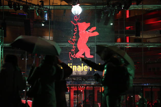 February 11, 2026, Berlin, Germany: People stand in front of the Berlinale Palast ahead of the 76th Berlin International Film Festival (Berlinale) in Berlin. The festival runs from Feb. 12 to 22, 2026. Berlin Germany - ZUMAf146 20260211_zip_f146_004 Copyright: xRouzbehxFouladix