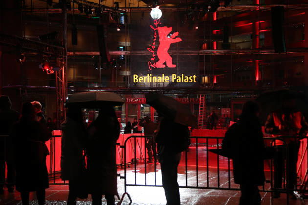 February 11, 2026, Berlin, Germany: People stand in front of the Berlinale Palast ahead of the 76th Berlin International Film Festival (Berlinale) in Berlin. The festival runs from Feb. 12 to 22, 2026. Berlin Germany - ZUMAf146 20260211_zip_f146_006 Copyright: xRouzbehxFouladix