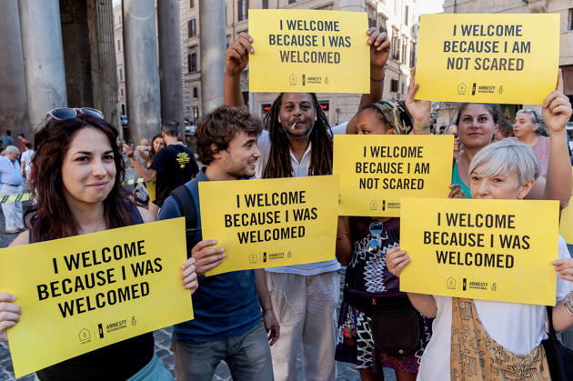 Amnesty International hold flashmob for World Refugee Day ROME, ITALY - JUNE 20: Activists of human rights organization Amnesty International hold in front of the Pantheon during a flashmob on World Refugee Day on June 20, 2017 in Rome, Italy. Amnesty International calls on the international community to take concrete action to support the protection of refugees, activate safe channels and mobility opportunities and create an alternative to dangerous irregular crossings. Rome Italy Copyright: xStefanoxMontesix