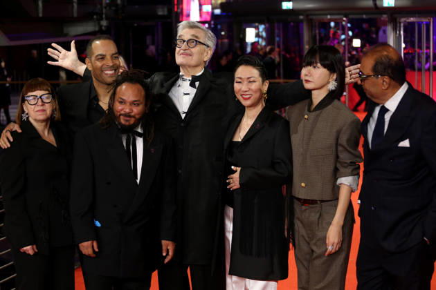 February 12, 2026, Berlin, Germany: International Jury members Shivendra Singh Dungarpur, Min Bahadur Bham, Jury President Wim Wenders, Bae Doona, Hikari, Ewa Puszczynska, and Reinaldo Marcus Green pose on the red carpet at the opening ceremony of the 76th Berlin International Film Festival (Berlinale), which is Europe s first major film festival of the year, in Berlin. The festival runs from February 12 to 22, 2026. Berlin Germany  - ZUMAf146 20260212_zip_f146_089 Copyright: xRouzbehxFouladix