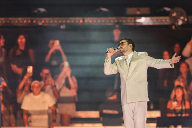 Bad Bunny performs first Buenos Aires concert of world tour BUENOS AIRES, ARGENTINA - FEBRUARY 13: Puerto Rican singer Bad Bunny performs during the first of his three scheduled shows at Estadio Monumental in Buenos Aires, Argentina, as part of his Debi Tirar Mas Fotos world tour, in Buenos Aires, Argentina on February 13, 2026. The artist arrived in Argentina following a high-profile appearance at the Super Bowl, where he delivered strong criticism of US policies, and after winning a Grammy Award, becoming the first Spanish-language album to receive the Album of the Year honor. The concert drew tens of thousands of fans, marking one of the most anticipated musical events of the year in the Argentine capital. Luciano Gonzalez Anadolu Bu Copyright: x2026xAnadoluxLucianoxGonzalezx