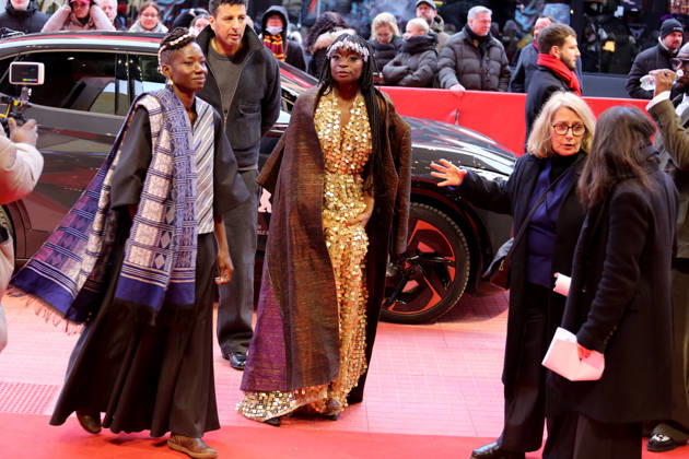 February 14, 2026, Berlin, Germany: Poundo Gomis and Senegalese actress Mamby Mawine attend the red carpet for the film Dao premiere during the 76th Berlin International Film Festival (Berlinale), which is Europe s first major film festival of the year, in Berlin. The festival runs from February 12 to 22, 2026. Berlin Germany - ZUMAf146 20260214_zip_f146_099 Copyright: xRouzbehxFouladix