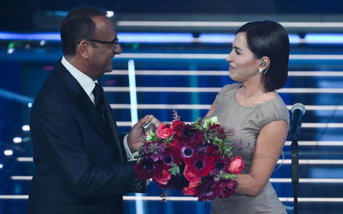 February 27, 2026, Sanremo, ITALY: (L-R) Sanremo Festival host and artistic director Carlo Conti and Italian singer Serena Brancale on stage at the Ariston theatre during the 76th edition of the Sanremo Italian Song Festival, in Sanremo, Italy, 26 February 2026. The Music Festival runs from 24 to 28 February 2026. ANSA ETTORE FERRARI Sanremo ITALY - ZUMAa110 20260227_zaf_a110_013 Copyright: xEttorexFerrarix