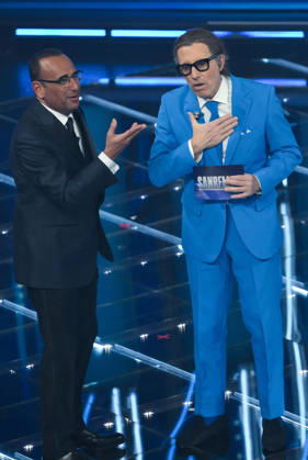 February 27, 2026, Sanremo, ITALY: (L-R) Sanremo Festival host and artistic director Carlo Conti and Italian actor Ubaldo Pantani on stage at the Ariston theatre during the 76th edition of the Sanremo Italian Song Festival, in Sanremo, Italy, 26 February 2026. The Music Festival runs from 24 to 28 February 2026. ANSA ETTORE FERRARI Sanremo ITALY - ZUMAa110 20260227_zaf_a110_018 Copyright: xEttorexFerrarix