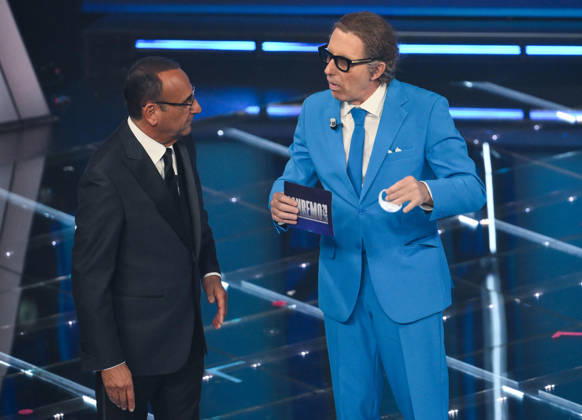 February 27, 2026, Sanremo, ITALY: (L-R) Sanremo Festival host and artistic director Carlo Conti and Italian actor Ubaldo Pantani on stage at the Ariston theatre during the 76th edition of the Sanremo Italian Song Festival, in Sanremo, Italy, 26 February 2026. The Music Festival runs from 24 to 28 February 2026. ANSA ETTORE FERRARI Sanremo ITALY - ZUMAa110 20260227_zaf_a110_019 Copyright: xEttorexFerrarix
