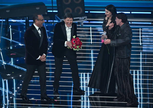 February 27, 2026, Sanremo, Italy: (L-R) Sanremo Festival host and artistic director Carlo Conti with Italian singers Gianni Morandi, Laura Pausini and Tredici Pietro perform on stage at the Ariston theatre during the 76th edition of the Sanremo Italian Song Festival, in Sanremo, Italy, 27 February 2026. The music festival will run from 24 to 28 February 2026. ANSA RICCARDO ANTIMIANI. Sanremo Italy - ZUMAa110 20260227_zaf_a110_162 Copyright: xRiccardoxAntimianix