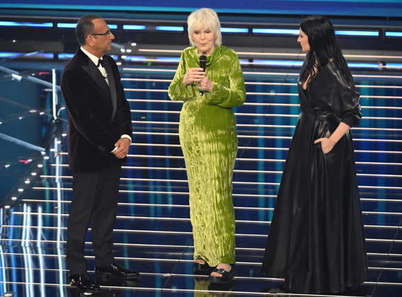 February 27, 2026, Sanremo, ITALY: (L-R) Sanremo Festival host and artistic director Carlo Conti, Italian singer Caterina Caselli and Italian singer Laura Pausini on stage at the Ariston theatre during the 76th edition of the Sanremo Italian Song Festival, in Sanremo, Italy, 27 February 2026. The music festival will run from 24 to 28 February 2026. ANSA RICCARDO ANTIMIANI. Sanremo ITALY - ZUMAa110 20260227_zaf_a110_206 Copyright: xRiccardoxAntimianix