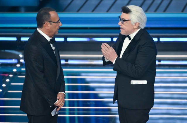 February 28, 2026, Sanremo, ITALY: (L-R) Sanremo Festival host and artistic director Carlo Conti snd Italian actror Nino Frassica on stage at the Ariston theatre during the 76th edition of the Sanremo Italian Song Festival, in Sanremo, Italy, 28 February 2026. The Music Festival runs from 24 to 28 February 2026. ANSA ETTORE FERRARI Sanremo ITALY - ZUMAa110 20260228_zaf_a110_169 Copyright: xEttorexFerrarix