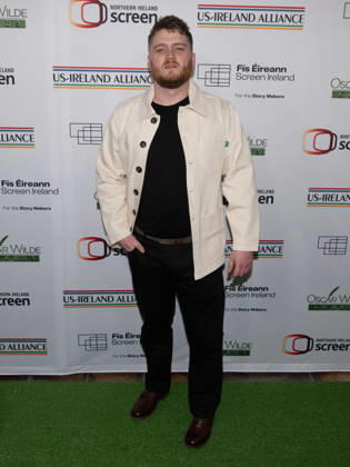 March 12, 2026, Los Angeles, California, USA: Irish singer DAVE LOFTS attends the 20th Annual Oscar Wilde Awards green carpet. Los Angeles USA - ZUMAb173 20260312_aap_b173_009 Copyright: xBillyxBennightx