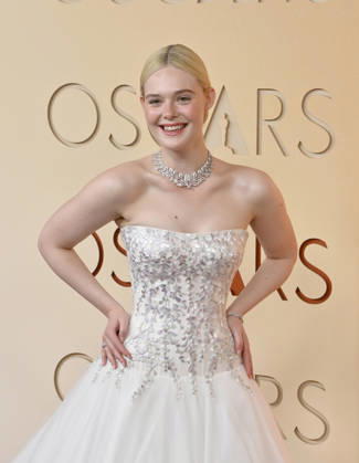 Elle Fanning arrives on the red carpet for the 98th annual Academy Awards in the Hollywood section of Los Angeles on Sunday, March 15, 2026. Conan O Brien will host the Oscars for the second consecutive year.  LAP20260315183 JIMxRUYMEN