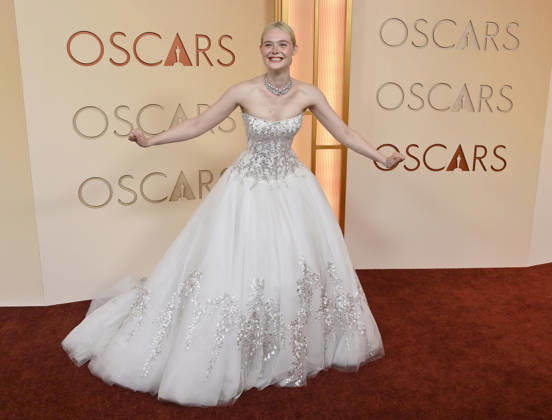 Elle Fanning arrives on the red carpet for the 98th annual Academy Awards in the Hollywood section of Los Angeles on Sunday, March 15, 2026. Conan O Brien will host the Oscars for the second consecutive year.  LAP20260315187 JIMxRUYMEN