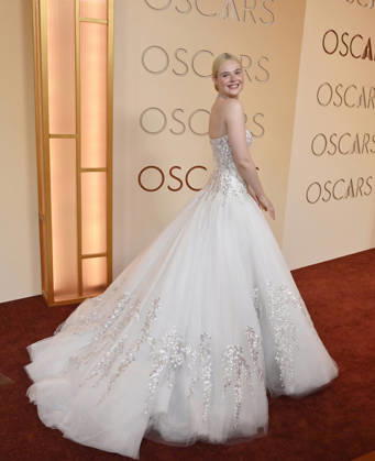 Elle Fanning arrives on the red carpet for the 98th annual Academy Awards in the Hollywood section of Los Angeles on Sunday, March 15, 2026. Conan O Brien will host the Oscars for the second consecutive year.  LAP20260315189 JIMxRUYMEN