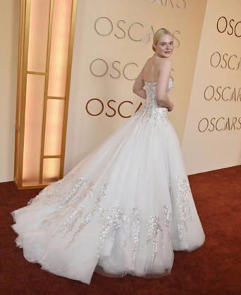 Elle Fanning arrives on the red carpet for the 98th annual Academy Awards in the Hollywood section of Los Angeles on Sunday, March 15, 2026. Conan O Brien will host the Oscars for the second consecutive year.  LAP20260315191 JIMxRUYMEN