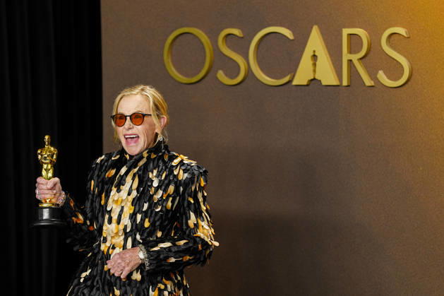 Amy Madigan holds the Oscar award in the press photo room after winning Best Actress in a Supporting Role for Weapons during the 98th annual Academy Awards in the Hollywood section of Los Angeles on Sunday, March 15, 2026. Conan O Brien is hosting the Oscars for the second consecutive year.  LAP20260315301 BONNIExCASH