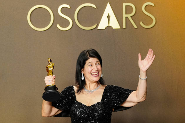 Cassandra Kulukundis celebrates in the press photo room after winning the Best Casting Oscar for One Battle After Another during the 98th annual Academy Awards in the Hollywood section of Los Angeles on Sunday, March 15, 2026. Conan O Brien is hosting the Oscars for the second consecutive year.  LAP20260315333 BONNIExCASH
