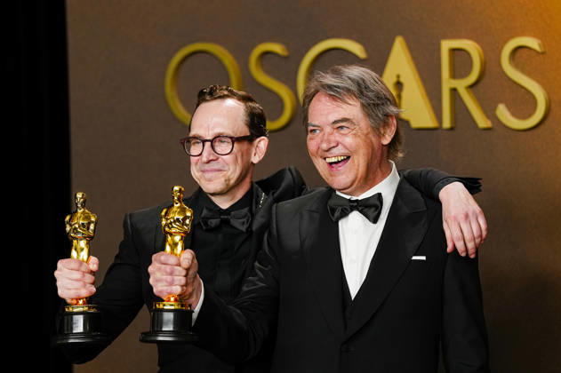 Chris Lavis and Maciek Szczerbowski celebrate in the press photo room after winning the Best Animated Short Film Oscar for The Girl Who Cried Pearls during the 98th annual Academy Awards in the Hollywood section of Los Angeles on Sunday, March 15, 2026. Conan O Brien is hosting the Oscars for the second consecutive year.  LAP202603152305 BONNIExCASH
