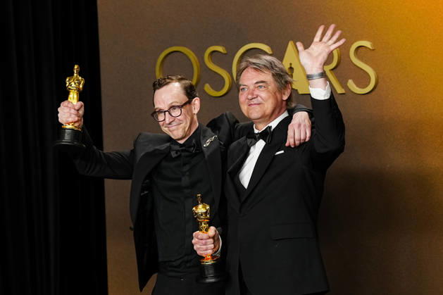 Chris Lavis and Maciek Szczerbowski celebrate in the press photo room after winning the Best Animated Short Film Oscar for The Girl Who Cried Pearls during the 98th annual Academy Awards in the Hollywood section of Los Angeles on Sunday, March 15, 2026. Conan O Brien is hosting the Oscars for the second consecutive year.  LAP202603152306 BONNIExCASH