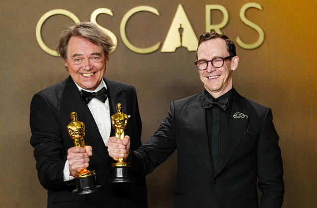 Chris Lavis and Maciek Szczerbowski celebrate in the press photo room after winning the Best Animated Short Film Oscar for The Girl Who Cried Pearls during the 98th annual Academy Awards in the Hollywood section of Los Angeles on Sunday, March 15, 2026. Conan O Brien is hosting the Oscars for the second consecutive year.  LAP202603152308 BONNIExCASH