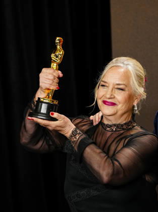 Tamara Deverell celebrates in the press photo room after winning the Best Production Design Oscar for Frankenstein during the 98th annual Academy Awards in the Hollywood section of Los Angeles on Sunday, March 15, 2026.  LAP20260315364 BONNIExCASH
