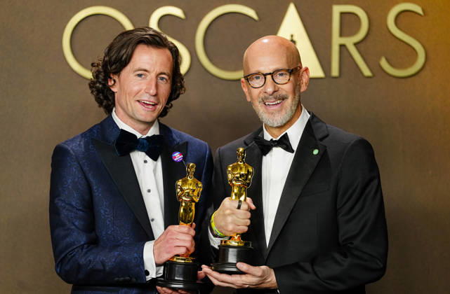 Conall Jones and Joshua Seftel celebrate in the press photo room after winning the Best Documentary Short Film Oscar for All the Empty Rooms during the 98th annual Academy Awards in the Hollywood section of Los Angeles on Sunday, March 15, 2026.  LAP2026031537176 BONNIExCASH