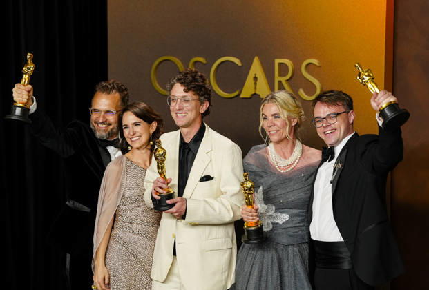 David Borenstein, Pavel Talankin, Helle Faber, Alzbeta Karaskova, and Robin Hessman celebrate in the press photo room after winning the Best Documentary Feature Film Oscar for Mr. Nobody Against Putin during the 98th annual Academy Awards in the Hollywood section of Los Angeles on Sunday, March 15, 2026.  LAP20260315378 BONNIExCASH