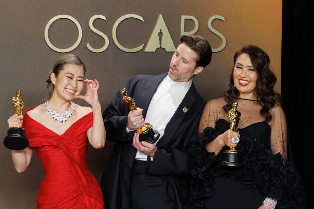 March 15, 2026, Hollywood, California, USA: (L-R) Maggie Kang, Chris Appelhans, and Michelle L.M. Wong, winners of the Best Animated Feature Film Award for â€oeKPop Demon Huntersâ€Â, pose in the press room of the 98th Annual Academy Awards on Sunday March 15, 2026 at the Dolby Theater in Hollywood, California. PRENSA INTERNACIONAL Hollywood USA - ZUMAp124 20260315_zaa_p124_304 Copyright: xPrensaxInternacionalx