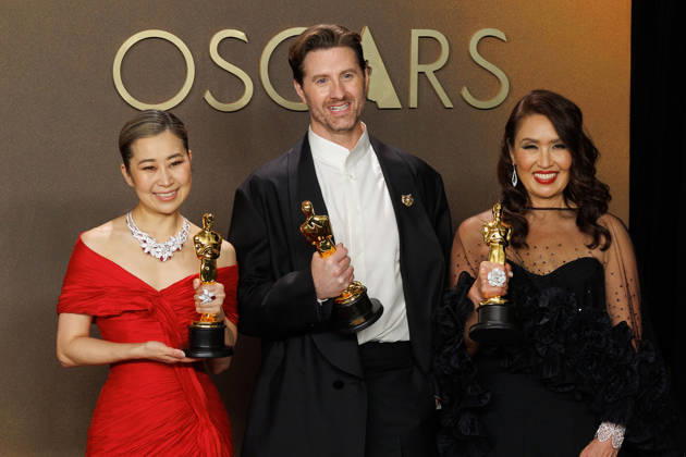 March 15, 2026, Hollywood, California, USA: (L-R) Maggie Kang, Chris Appelhans, and Michelle L.M. Wong, winners of the Best Animated Feature Film Award for â€oeKPop Demon Huntersâ€Â, pose in the press room of the 98th Annual Academy Awards on Sunday March 15, 2026 at the Dolby Theater in Hollywood, California. PRENSA INTERNACIONAL Hollywood USA - ZUMAp124 20260315_zaa_p124_328 Copyright: xPrensaxInternacionalx