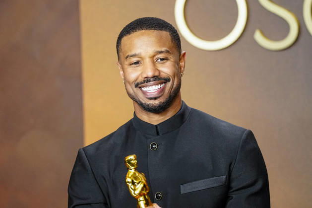 Michael B. Jordan celebrates in the press photo room after winning the Best Actor in a Leading Role Oscar for Sinners during the 98th annual Academy Awards in the Hollywood section of Los Angeles on Sunday, March 15, 2026.  LAP2026031543346 BONNIExCASH