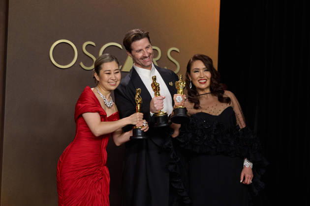 Maggie Kang, Chris Appelhans and Michelle Wong pose backstage with the OscarÂ® for Animated Feature Film during the 98th OscarsÂ® at DolbyÂ® Theatre at Ovation Hollywood on Sunday, March 15, 2026. Los Angeles CA USA  350081353PLX