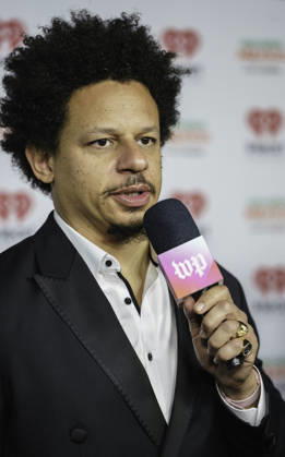 March 16, 2026: Austin, Texas. 2026 IHeartPodcast Awards, Hosts, Presenters, and Guest attendees arrive at the red carpet. Eric Andro , comedian and host speaks with the press. - ZUMAda1_ 20260316_zap_da1_078 Copyright: xSandraxDahdahx