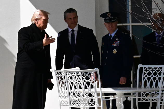 President Donald Trump Departs The White House (INT) President Donald Trump gestures a wave as he departs the White House with United States Secretary of War Pete Hegseth and United States Chairman of the Joint Chiefs of Staff Dan Caine in Washington, D.C., on March 18, 2026 for a trip to Dover Air Force Base for a dignified transfer where the remains of six U.S. service members killed in the crash of a refueling aircraft are returned to their families. It will be the second time since launching the war with Iran on Feb. 28 that the Republican president will attend the solemn military ritual known as a dignified transfer, which he once described as the toughest thing he has had to do as commander in chief. Credit: Kyle Mazza Thenews2 Copyright: xKylexMazzax