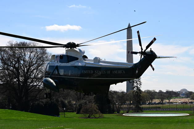 President Donald Trump Departs The White House (INT) President Donald Trump gestures a wave as he departs the White House with United States Secretary of War Pete Hegseth and United States Chairman of the Joint Chiefs of Staff Dan Caine in Washington, D.C., on March 18, 2026 for a trip to Dover Air Force Base for a dignified transfer where the remains of six U.S. service members killed in the crash of a refueling aircraft are returned to their families. It will be the second time since launching the war with Iran on Feb. 28 that the Republican president will attend the solemn military ritual known as a dignified transfer, which he once described as the toughest thing he has had to do as commander in chief. Credit: Kyle Mazza Thenews2 Copyright: xKylexMazzax