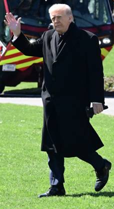 President Donald Trump Departs The White House (INT) President Donald Trump gestures a wave as he departs the White House with United States Secretary of War Pete Hegseth and United States Chairman of the Joint Chiefs of Staff Dan Caine in Washington, D.C., on March 18, 2026 for a trip to Dover Air Force Base for a dignified transfer where the remains of six U.S. service members killed in the crash of a refueling aircraft are returned to their families. It will be the second time since launching the war with Iran on Feb. 28 that the Republican president will attend the solemn military ritual known as a dignified transfer, which he once described as the toughest thing he has had to do as commander in chief. Credit: Kyle Mazza Thenews2 Copyright: xKylexMazzax
