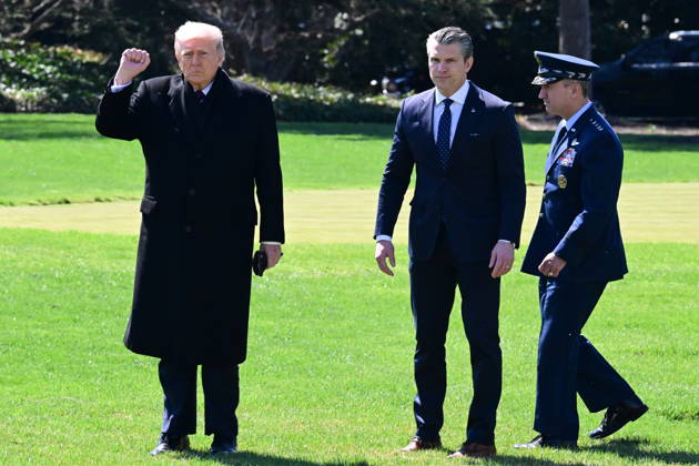 President Donald Trump Departs The White House (INT) President Donald Trump gestures a fist bump as he departs the White House with United States Secretary of War Pete Hegseth and United States Chairman of the Joint Chiefs of Staff Dan Caine in Washington, D.C., on March 18, 2026 for a trip to Dover Air Force Base for a dignified transfer where the remains of six U.S. service members killed in the crash of a refueling aircraft are returned to their families. It will be the second time since launching the war with Iran on Feb. 28 that the Republican president will attend the solemn military ritual known as a dignified transfer, which he once described as the toughest thing he has had to do as commander in chief. Credit: Kyle Mazza Then Copyright: xKylexMazzax