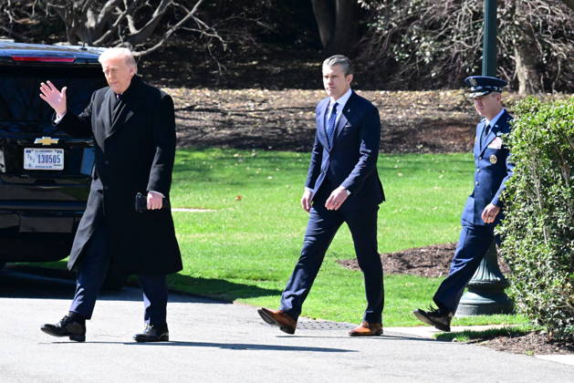 President Donald Trump Departs The White House (INT) President Donald Trump gestures a wave as he departs the White House with United States Secretary of War Pete Hegseth and United States Chairman of the Joint Chiefs of Staff Dan Caine in Washington, D.C., on March 18, 2026 for a trip to Dover Air Force Base for a dignified transfer where the remains of six U.S. service members killed in the crash of a refueling aircraft are returned to their families. It will be the second time since launching the war with Iran on Feb. 28 that the Republican president will attend the solemn military ritual known as a dignified transfer, which he once described as the toughest thing he has had to do as commander in chief. Credit: Kyle Mazza Thenews2 Copyright: xKylexMazzax