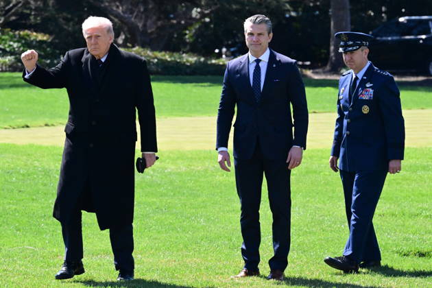 President Donald Trump Departs The White House (INT) President Donald Trump gestures a fist bump as he departs the White House with United States Secretary of War Pete Hegseth and United States Chairman of the Joint Chiefs of Staff Dan Caine in Washington, D.C., on March 18, 2026 for a trip to Dover Air Force Base for a dignified transfer where the remains of six U.S. service members killed in the crash of a refueling aircraft are returned to their families. It will be the second time since launching the war with Iran on Feb. 28 that the Republican president will attend the solemn military ritual known as a dignified transfer, which he once described as the toughest thing he has had to do as commander in chief. Credit: Kyle Mazza Then Copyright: xKylexMazzax