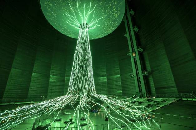 New exhibition in the Gasometer Oberhausen, art sculpture The Tree, 40 meter high light installation, shows with light and music different stages of a tree, exhibition Mythos Wald, on 3 levels and with several thematic chapters the exhibition shows the diversity of the worlds forests with pictures, videos and exhibits, NRW, Germany, Mythos Wald Oberhausen
