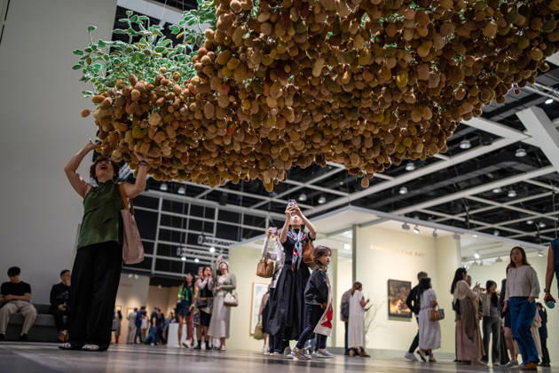 HONGKONG-ART ART-BASEL People looking at an art display at Art Basel 2026 in Hong Kong, March 26, 2026. NEXPHER Vernon Yuen HONG KONG