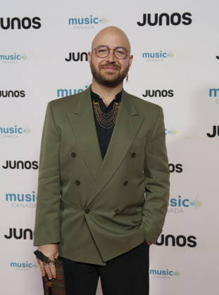 March 28, 2026, Hamilton, On, CANADA: Haitham Haidar, nominated for Classical Album of the Year, Solo Artist, poses on the red carpet at the 2026 Juno Awards Gala in Hamilton, Ont. on Saturday, March 28, 2026. Hamilton CANADA - ZUMAc35_ 20260328_zaf_c35_049 Copyright: xPeterxPowerx