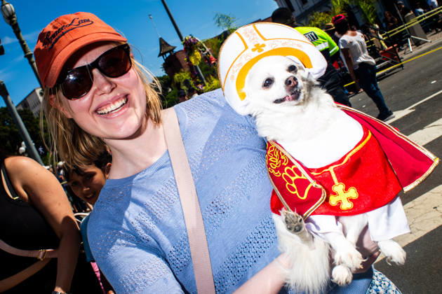 April 4, 2026, Los Angeles, California, USA: A woman holds her dog wearing a Catholic costume during the yearly Blessing of the Animals at Olvera Street on Saturday, April 4, 2026 in Los Angeles, California. Los Angeles USA - ZUMAh206 20260404_znp_h206_014 Copyright: xBenjaminxHansonx
