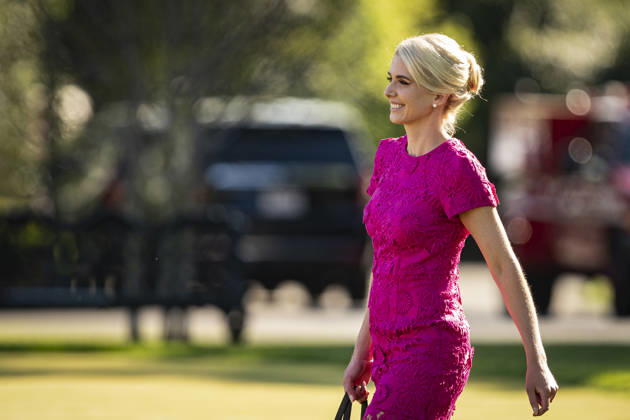 April 10, 2026, Washington, District Of Columbia, USA: Natalie Harp, executive assistant to US President Donald Trump, walks behind President Donald Trump to Marine One on the South Lawn of the White House, on Friday, April 10, 2026 in Washington, DC. President Donald Trump is traveling to his winery in Charlottesville, Virginia Washington USA - ZUMAs152 20260410_faa_s152_030 Copyright: xAlxDragox-xPoolxviaxCNPx