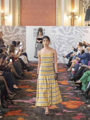 April 12, 2026, Madrid, Madrid, Spain: MADRID, SPAIN - APRIL 12: A model showcases a creation by TRADICIONES ISABELA during the Pasarela EspaoÂ±ola LimeLife at Casino Gran Via on April 12, 2026 in Madrid, Spain. Madrid Spain - ZUMAh199 20260412_zip_h199_012 Copyright: xAaronxHerediax